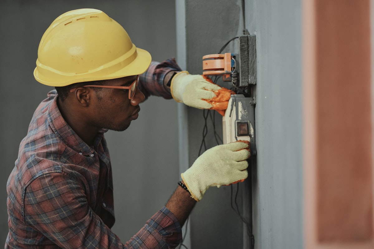 Simply Metal engineer working on a control panel